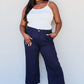 And The Why In The Mix Full Size Pleated Detail Linen Pants in Dark Navy