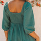 Smocked Three-Quarter Sleeve Peplum Blouse